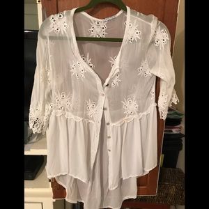 Mainstream Boutique M white high low shirt.